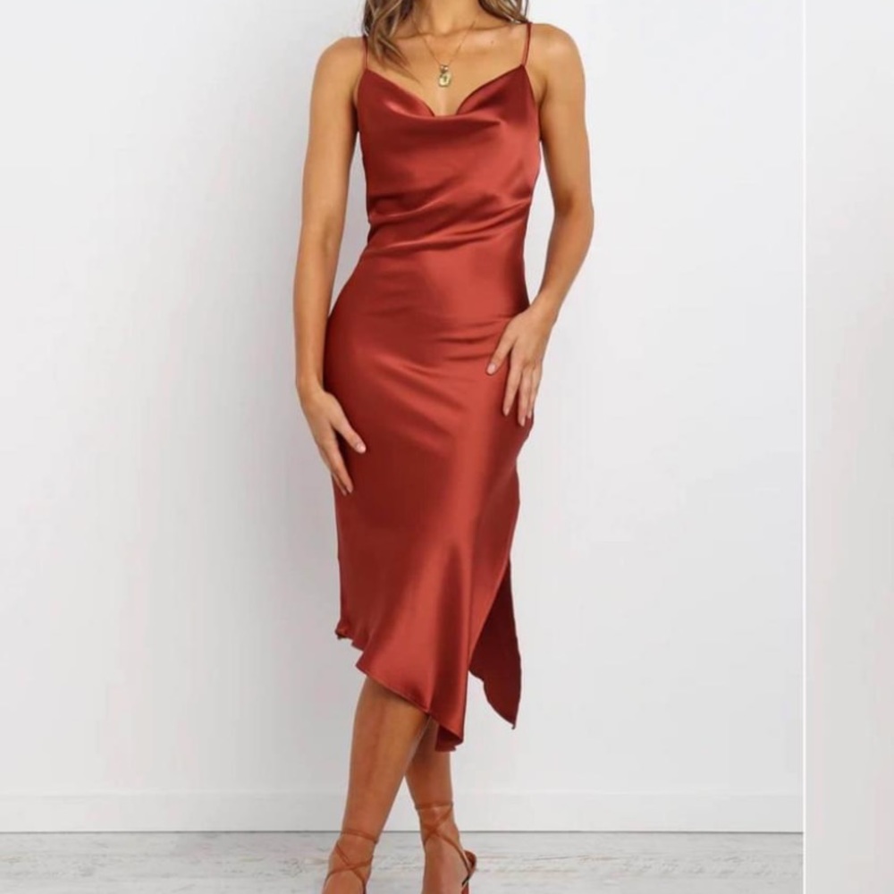 Worn once as bridesmaid. Absolutely stunning, beautiful color, very flattering!